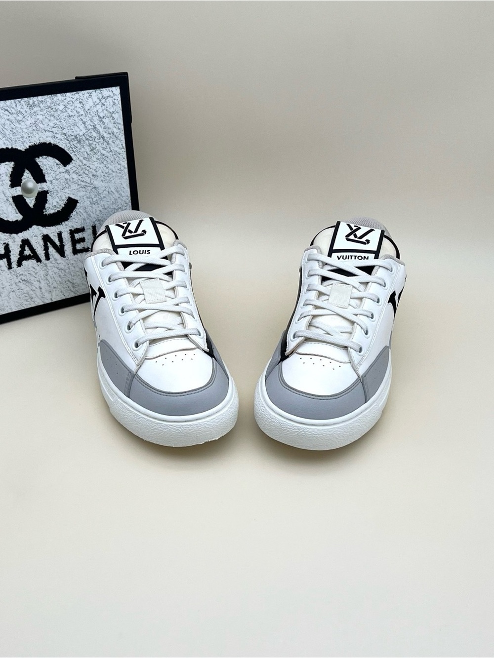 Louis Vuitton Men’s White and Gray Low-Top Sneakers with Black Logo